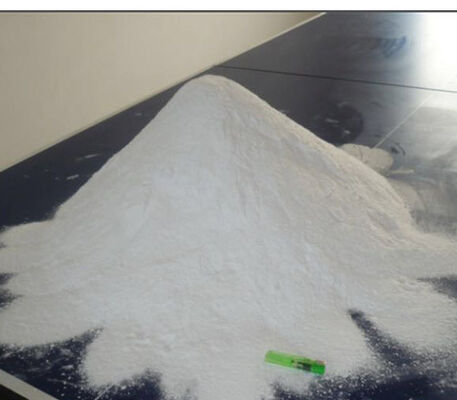 El cloruro anhidro del magnesio forma escamas minuto del 99%
